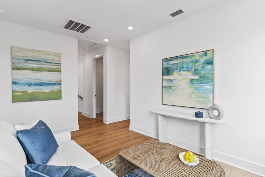 Furnished interior in a model home at Brizo in Santa Rosa Beach (Image 26).