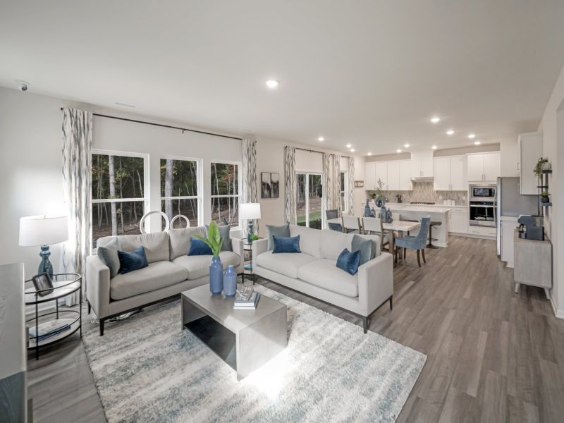 The expansive great room seamlessly connects the living, dining and kitchen areas together.