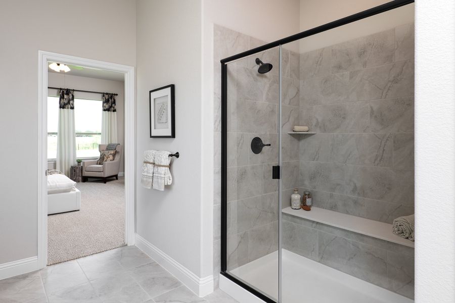 Furnished interior in a model home at Abe's Landing in Granbury (Image 19).