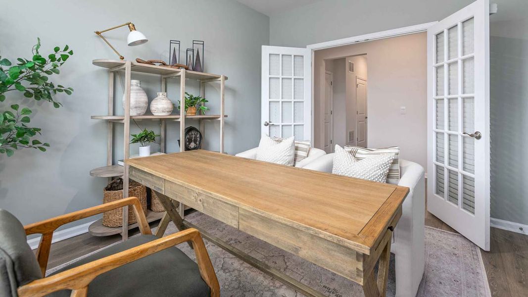 Furnished interior in a model home at Quarry Hills - Freedom in Swepsonville (Image 2).