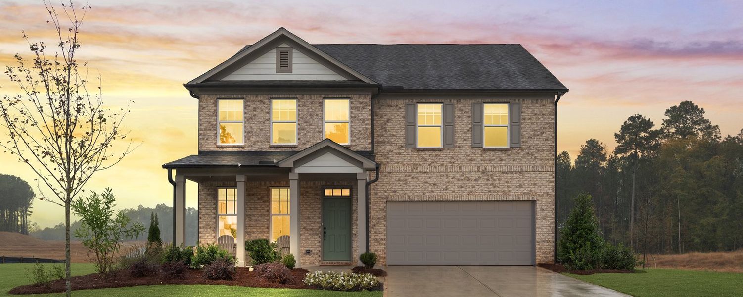 Front exterior of a home in the The Pointe at Heron Bay community, located in Locust Grove, GA (Image 5). Front exterior of a home in the The Pointe at Heron Bay community, located in Locust Grove, GA (Image 5).