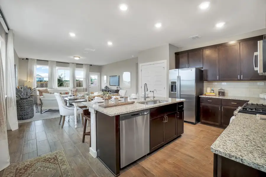 Furnished interior in a model home at Blue Ridge Ranch in San Antonio (Image 5).