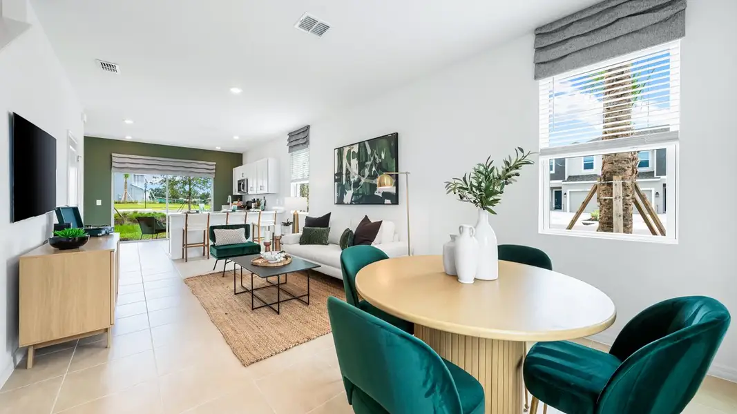 Furnished interior in a model home at The Townhomes at Westview in Kissimmee (Image 6).