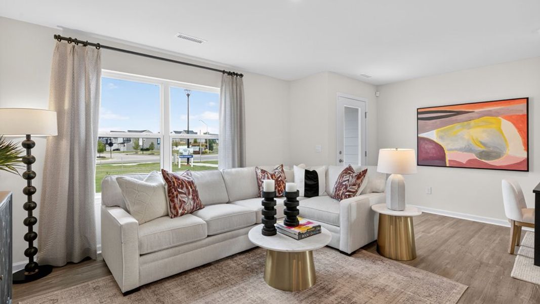 Furnished interior in a model home at The Townes at Belle Grove in Wendell (Image 12).