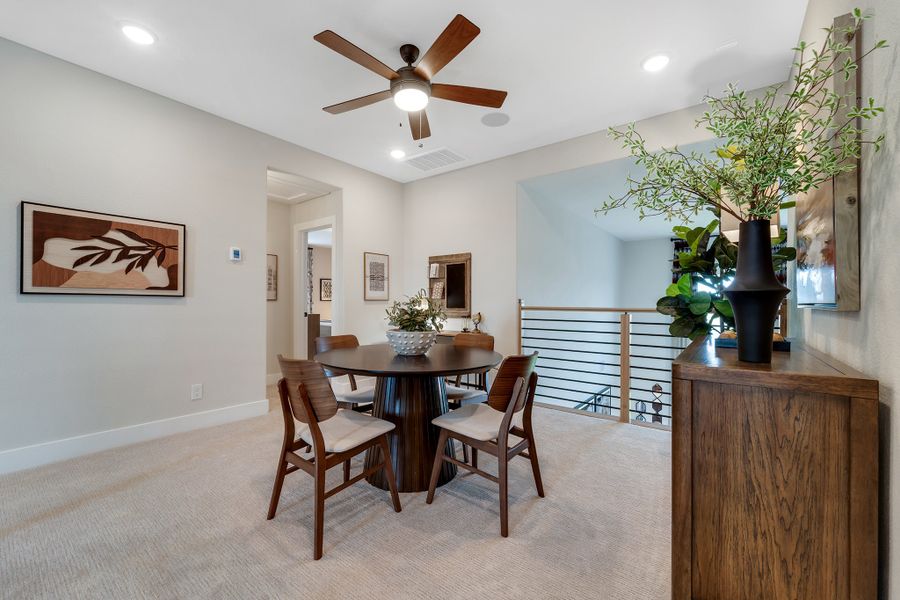 Furnished interior in a model home at Creekhaven in Iowa Colony (Image 18).