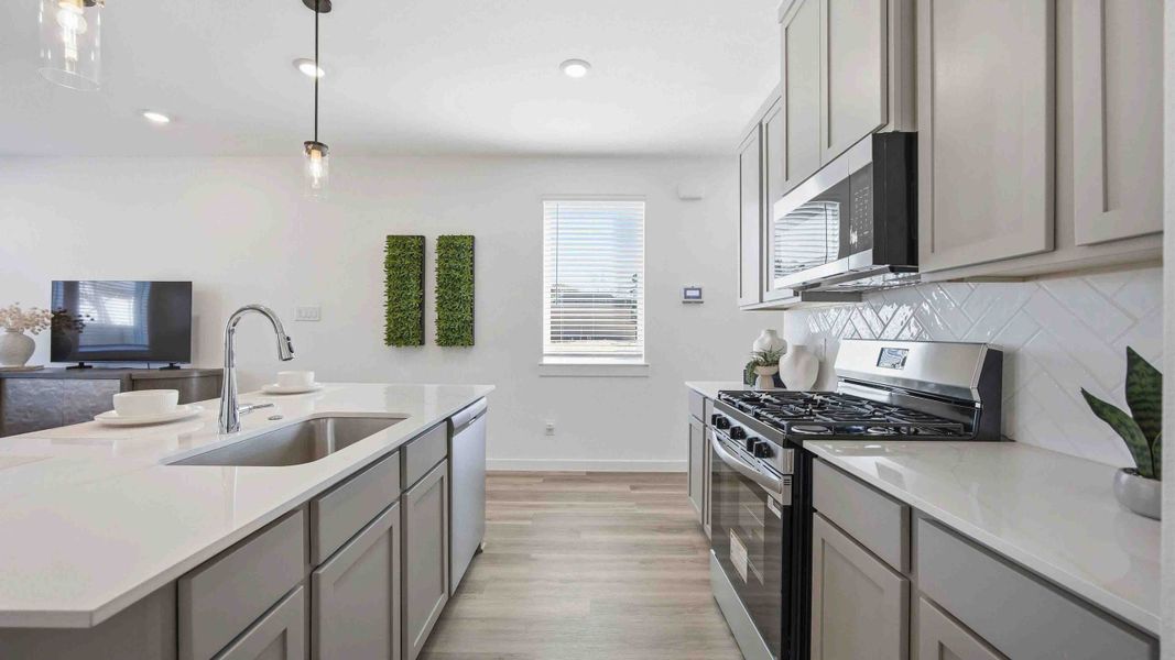 Furnished interior in a model home at Mansfield Park in Houston (Image 4).