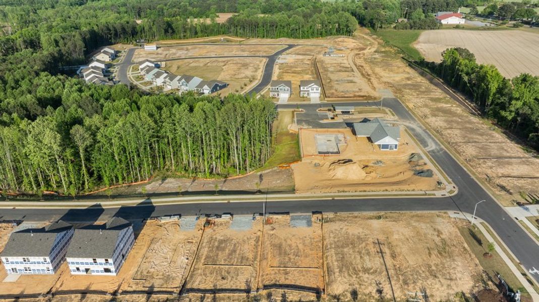 Site preparation and early development at The Townes at Bexford in Willow Spring, NC (Image 27). Site preparation and early development at The Townes at Bexford in Willow Spring, NC (Image 27).