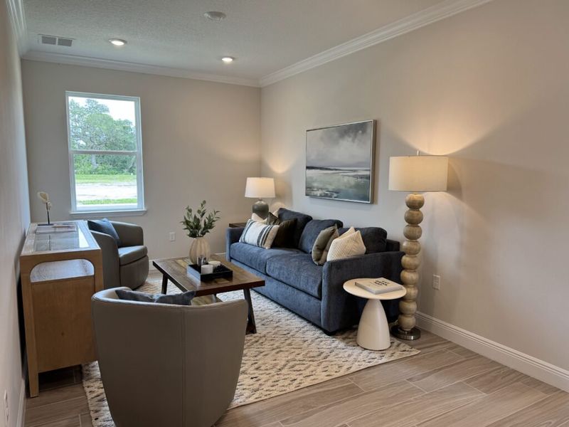 Furnished interior in a model home at Huntington Park in Titusville (Image 4). Furnished interior in a model home at Huntington Park in Titusville (Image 4).