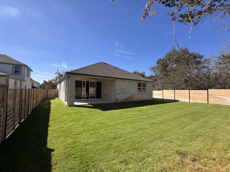 A charming brick home with a spacious backyard in Seasons at Highland Village by Richmond American Homes (Georgetown, TX). A charming brick home with a spacious backyard in Seasons at Highland Village by Richmond American Homes (Georgetown, TX).
