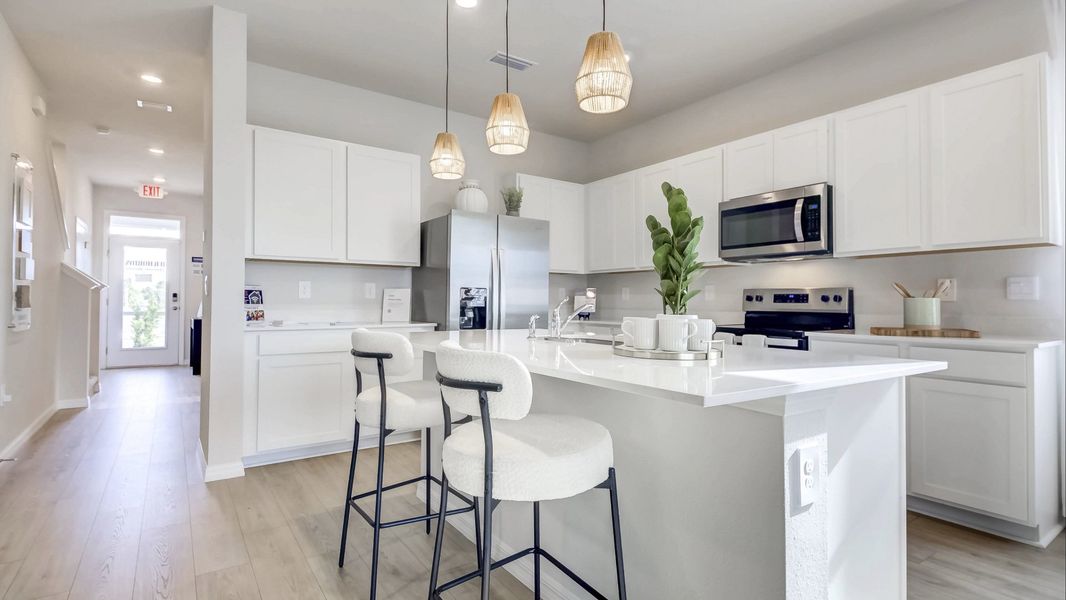 Furnished interior in a model home at The Gardens at Bay Street in Sarasota (Image 29).