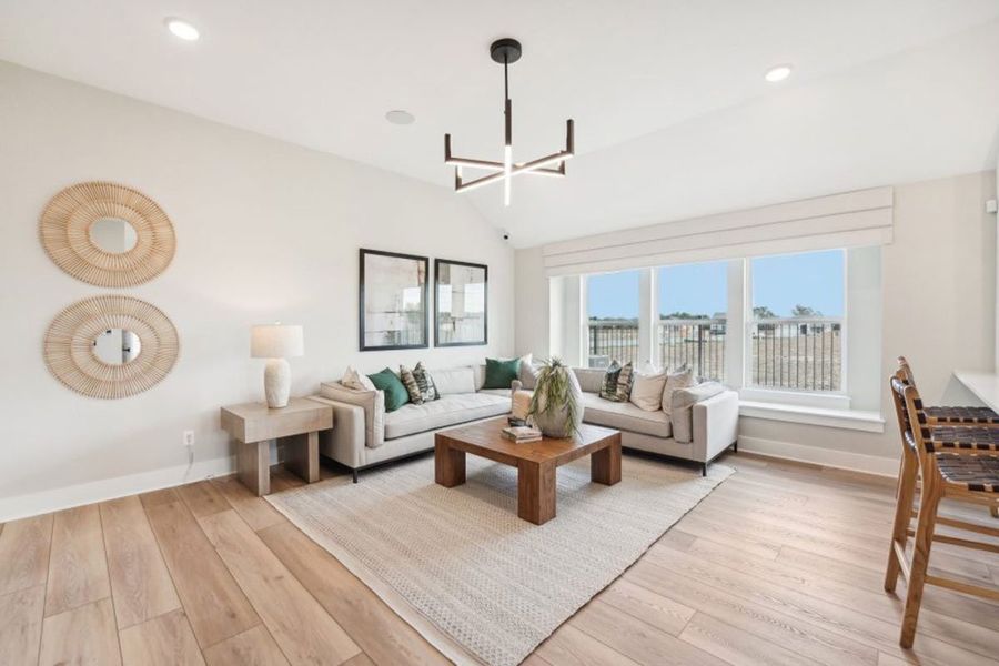 Furnished interior in a model home at Grande Estates in Bertram (Image 23).