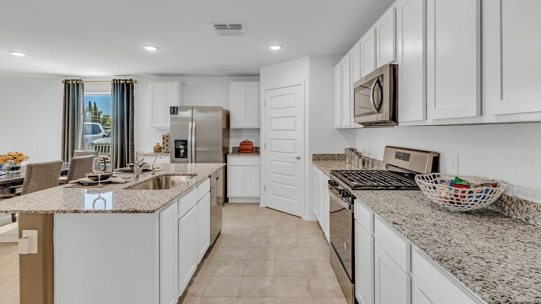 Furnished interior in a model home at Senita Crossing in Tucson (Image 5).