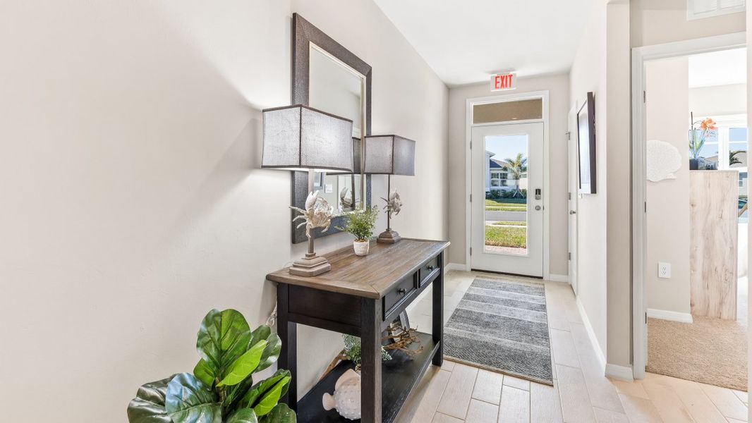 Furnished interior in a model home at Cove at West Port - Tradition in Port Charlotte (Image 10).