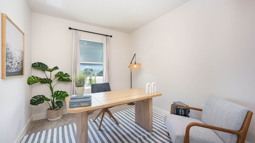 Furnished interior in a model home at Tortuga Cay in Satellite Beach (Image 18).