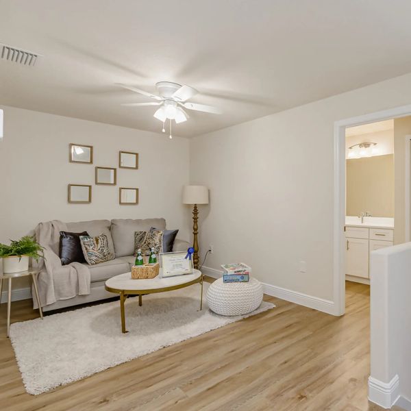 Furnished interior in a model home at Hidden Woods in Melbourne (Image 26).