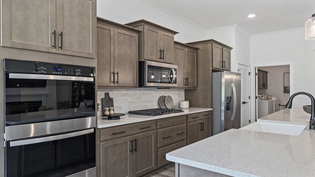 Furnished interior in a model home at Seven Oaks in Greenwood (Image 13).