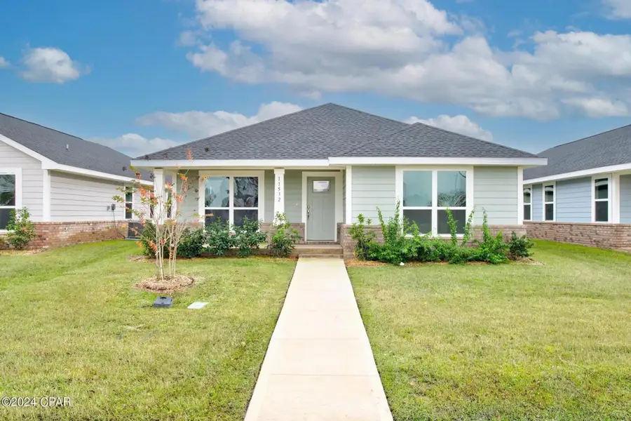 Front exterior of a home in the Brookwood community, located in Crestview, FL (Image 1).