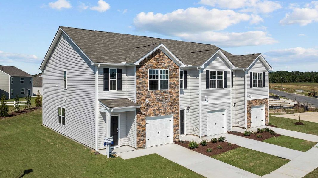 Front exterior of a home in the The Townes at Ridgewood Farms community, located in Winterville, NC (Image 14).