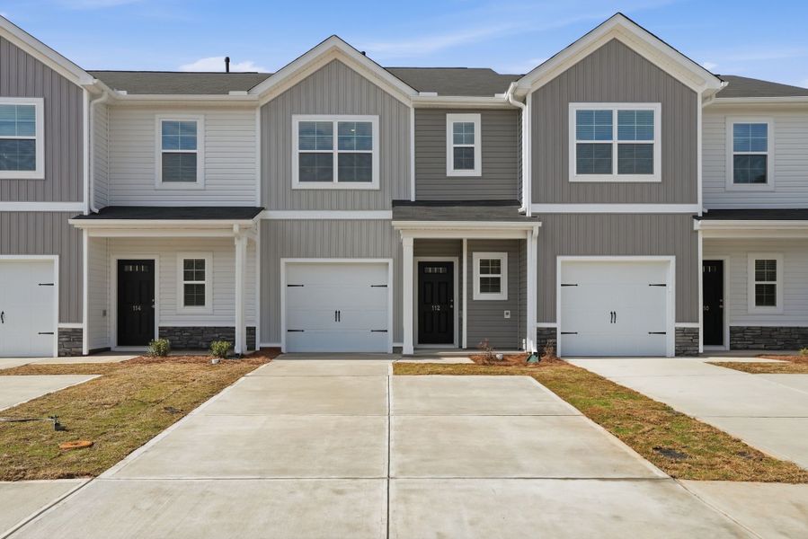 Front exterior of a home in the Towns at Lake Greenwood community, located in Greenwood, SC (Image 13).