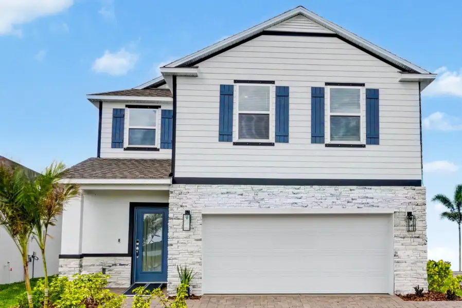 Front exterior of a home in the Malabar Springs community, located in Palm Bay, FL (Image 3).