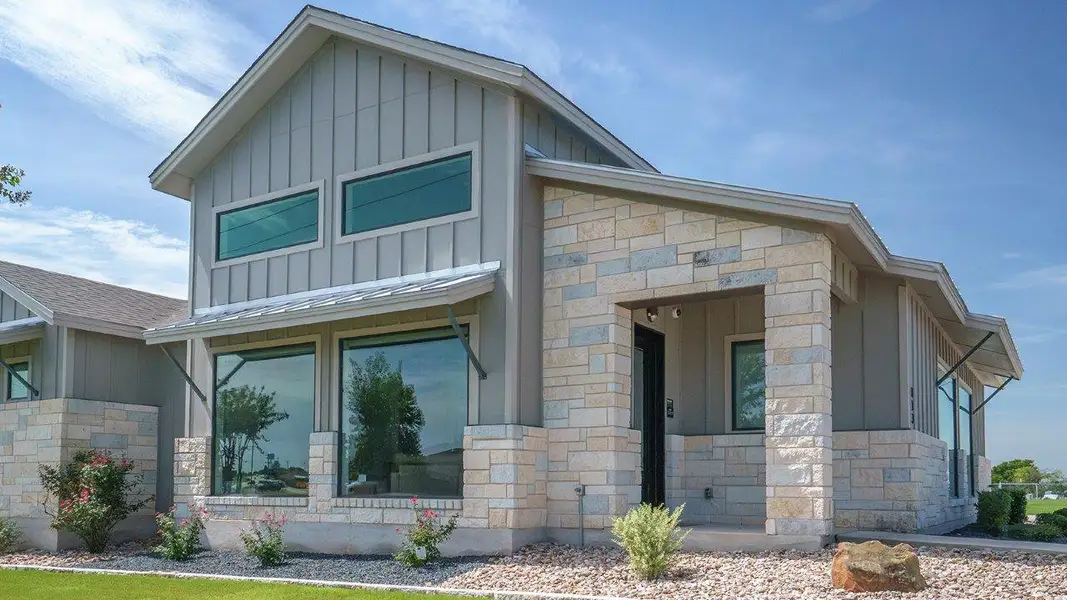 Front exterior of a home in the The Villages at Schwertner Ranch community, located in Jarrell, TX (Image 5).
