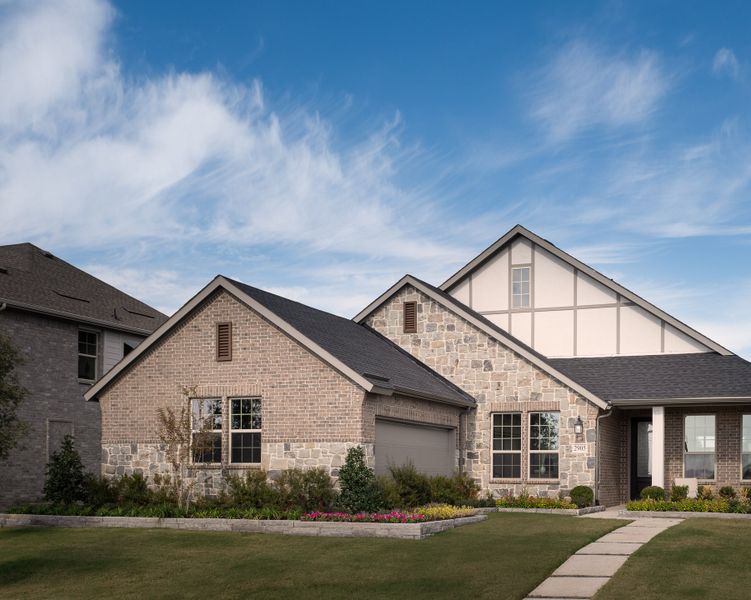 Front exterior of a home in the View at the Reserve 60s community, located in Mansfield, TX (Image 6).
