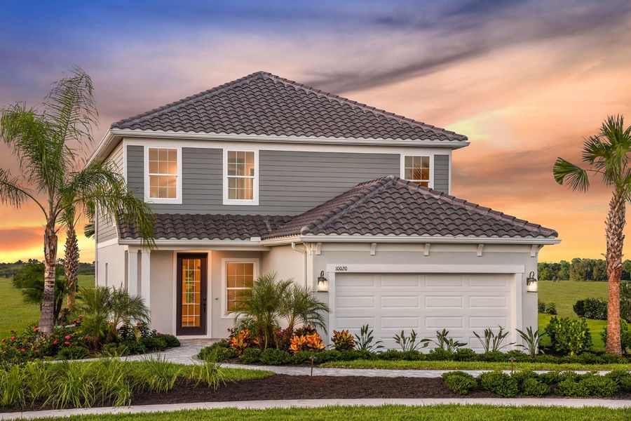 Front exterior of a home in the Grand Park community, located in Sarasota, FL (Image 4).