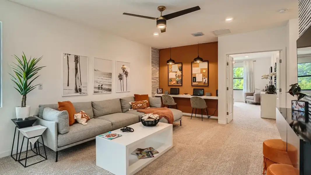 Furnished interior in a model home at Limestone Reserve in Jupiter (Image 3).