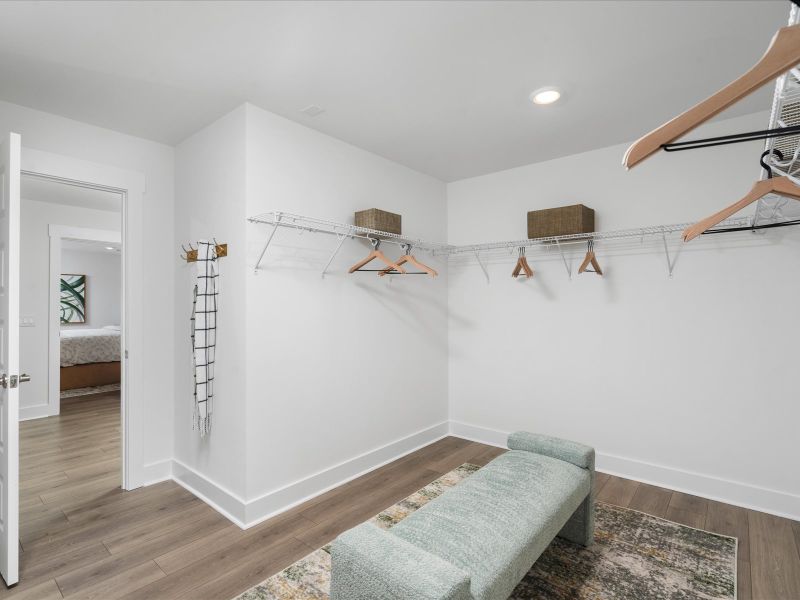 Furnished interior in a model home at The Coves at Lakes of Cane Bay in Summerville (Image 31). Furnished interior in a model home at The Coves at Lakes of Cane Bay in Summerville (Image 31).