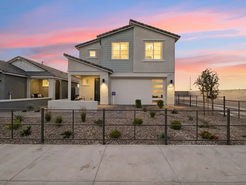 A house with a fence around it.