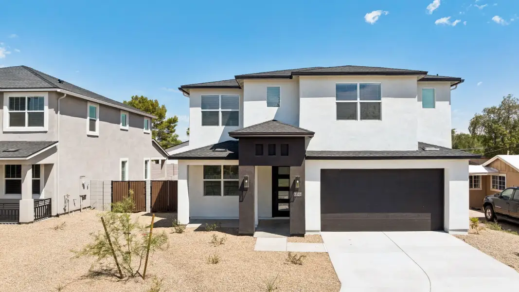 Front exterior of a home in the Oak Park Manor Signature Homesites community, located in Phoenix, AZ (Image 10).