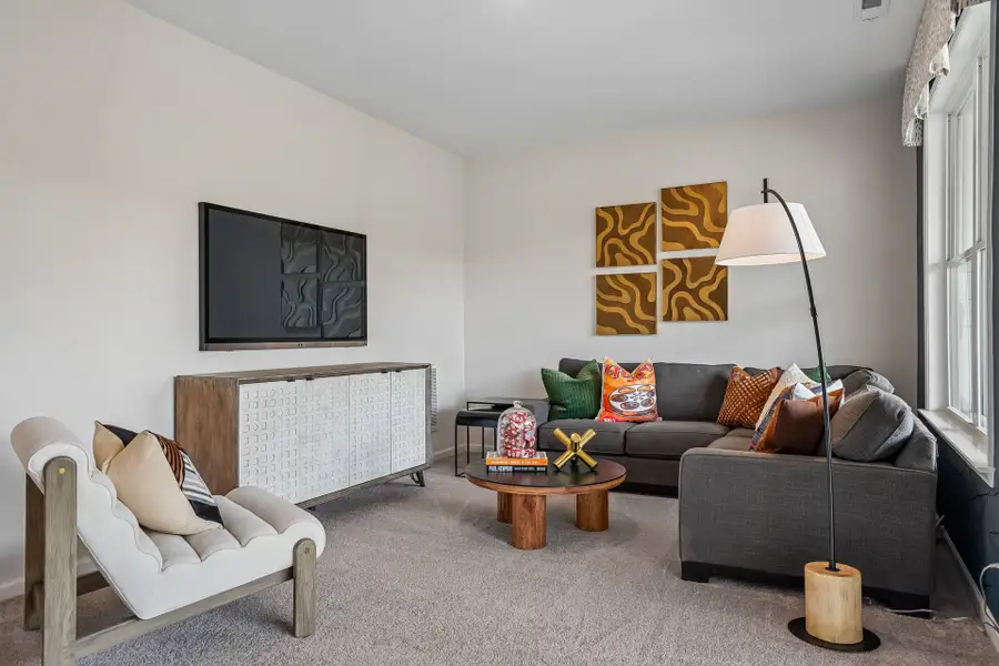 Furnished interior in a model home at South Lake Townes at Flowers Plantation in Clayton (Image 60).