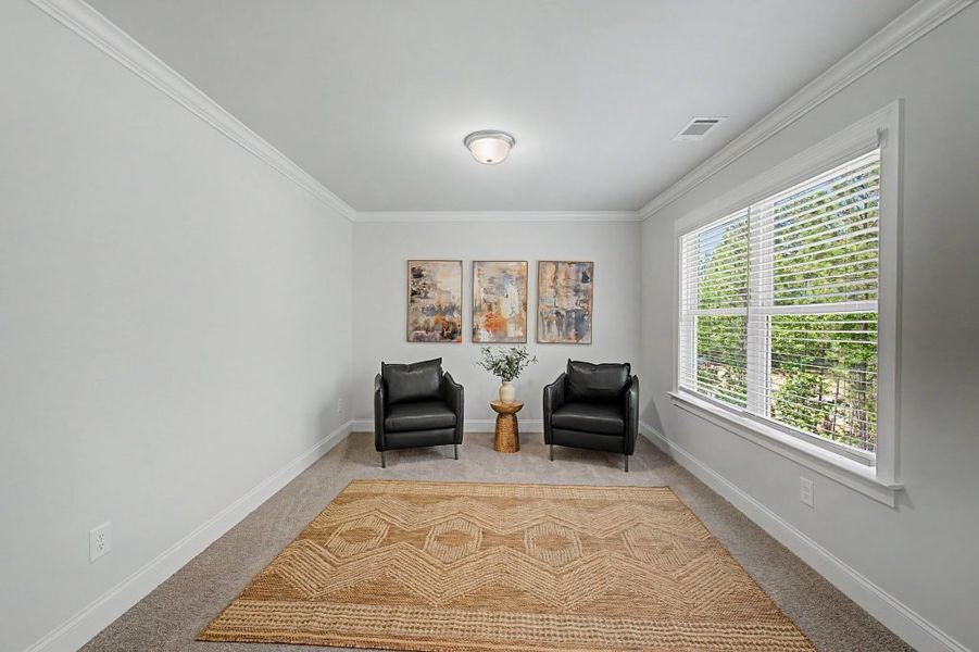 Furnished interior in a model home at The Estates at Hurricane Pointe in Douglasville (Image 30).