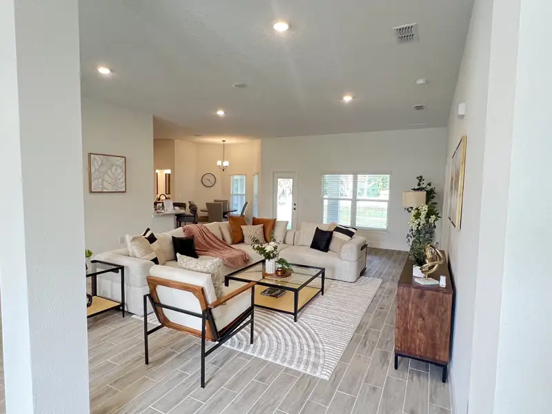Furnished interior in a model home at Hill Country Estates in Dade City (Image 4).