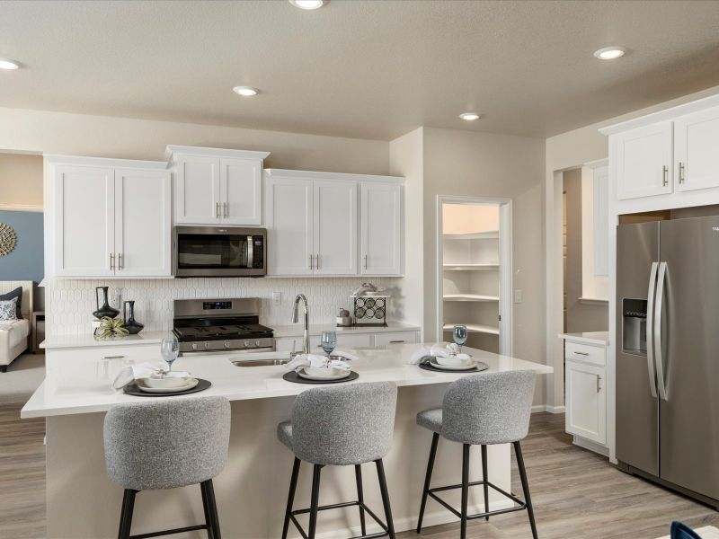 Furnished interior in a model home at Poudre Heights: The Alpine Collection in Windsor (Image 4).