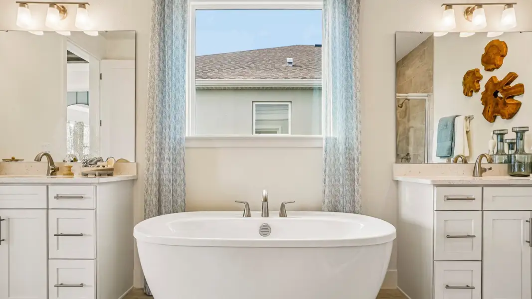 Primary En Suite Bathroom | Oleander Model Home at Ardisia Park in New Smyrna Beach