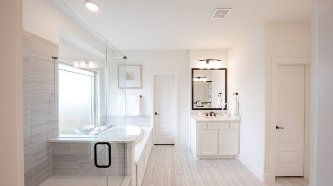 Furnished interior in a model home at Bear Creek in Cedar Hill (Image 7).