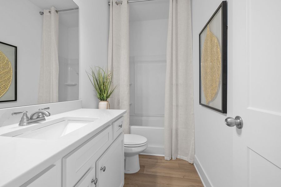 Furnished interior in a model home at Enclave at Harbor Club in Greensboro (Image 11).