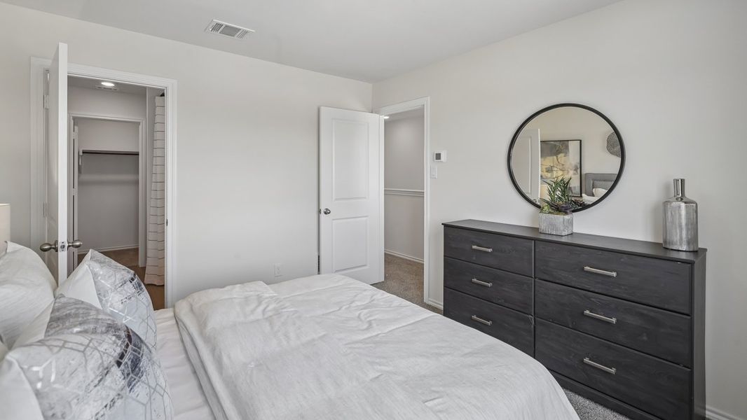 Furnished interior in a model home at Stonewood in Sulphur Springs (Image 29).