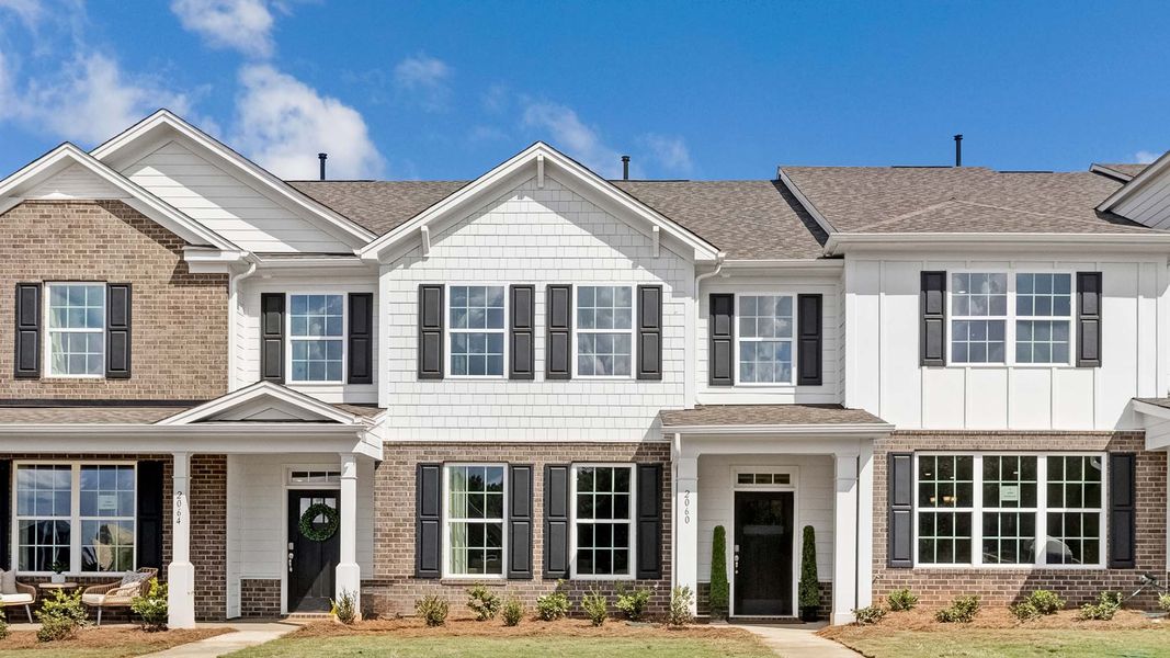 Front exterior of a home in the Sanctuary at Southgate Townhomes community, located in Indian Trail, NC (Image 1). Front exterior of a home in the Sanctuary at Southgate Townhomes community, located in Indian Trail, NC (Image 1).