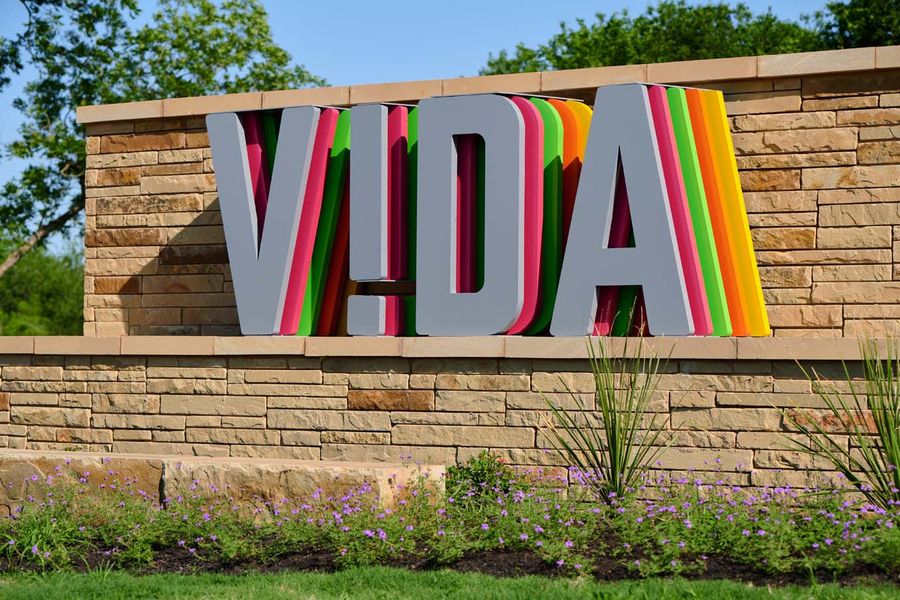 Entrance to the VIDA community in San Antonio, TX, featuring signage and landscaping (Image 14).