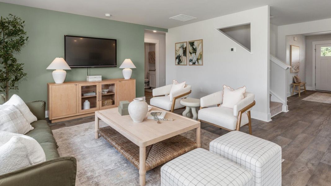 Furnished interior in a model home at Eagle Creek in Bolivia (Image 14).