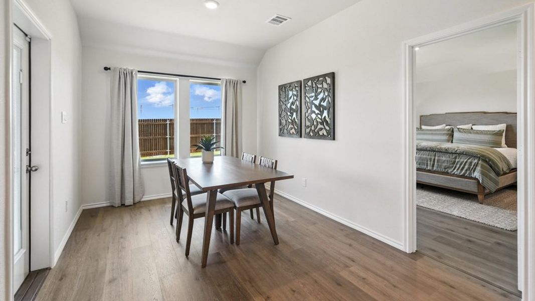 Furnished interior in a model home at Saddlebrook in Waxahachie (Image 9).