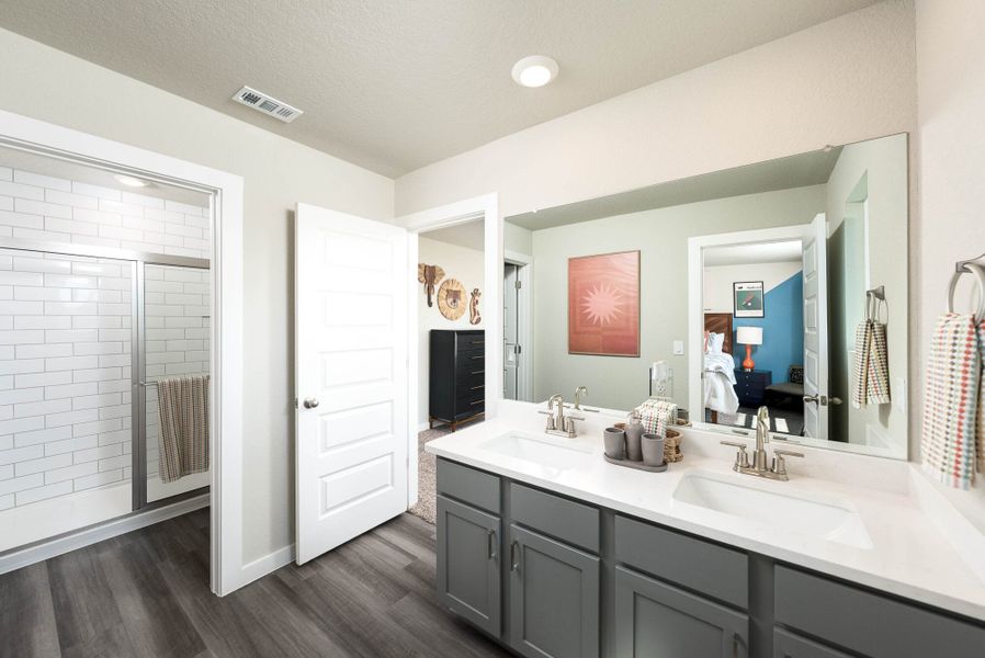 Furnished interior in a model home at August Fields in New Braunfels (Image 36).