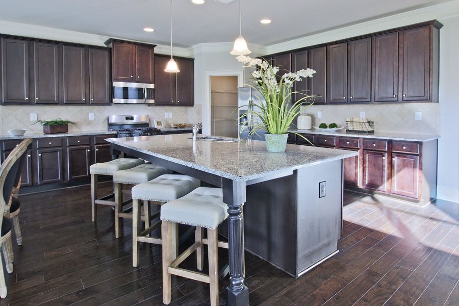 Furnished interior in a model home at Durham Lakes in Fairburn (Image 4).