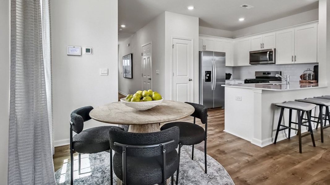 Furnished interior in a model home at The Townes at Prestleigh in Wake Forest (Image 10).