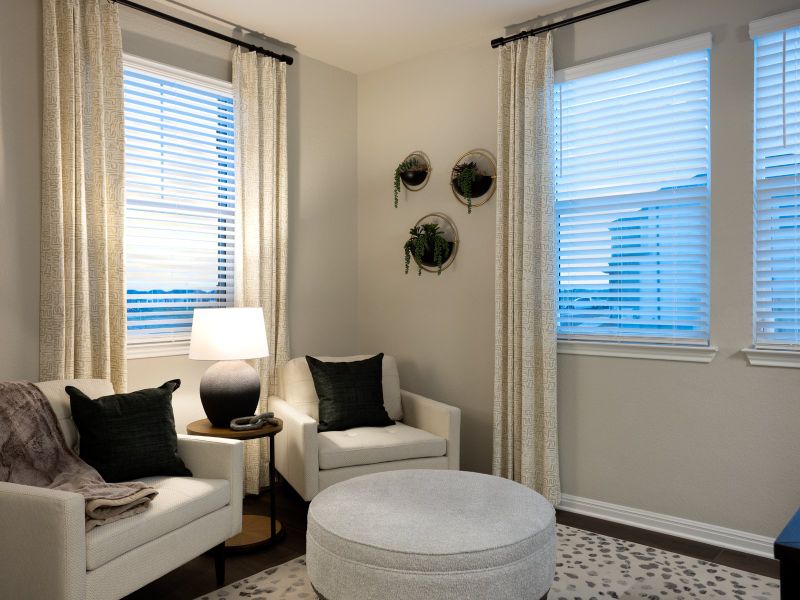 Furnished interior in a model home at Opal Meadows in Kyle (Image 21).