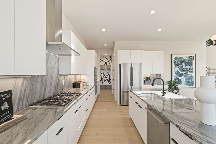 Furnished interior in a model home at Festival at RainDance in Windsor (Image 27).