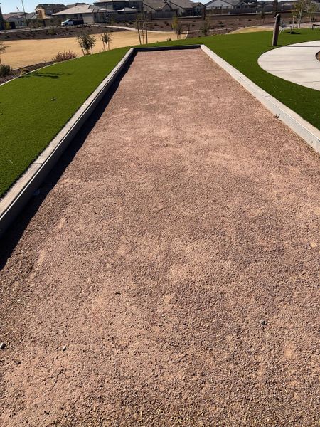 Elegant community bocce court in The Grove at El Cidro by William Ryan Homes, set in Goodyear, AZ.