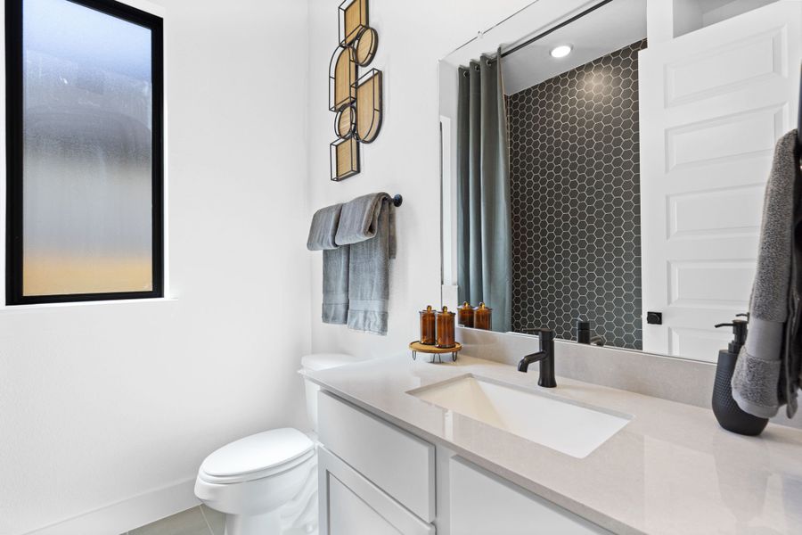 Furnished interior in a model home at Hunters Crossing in Sealy (Image 13).